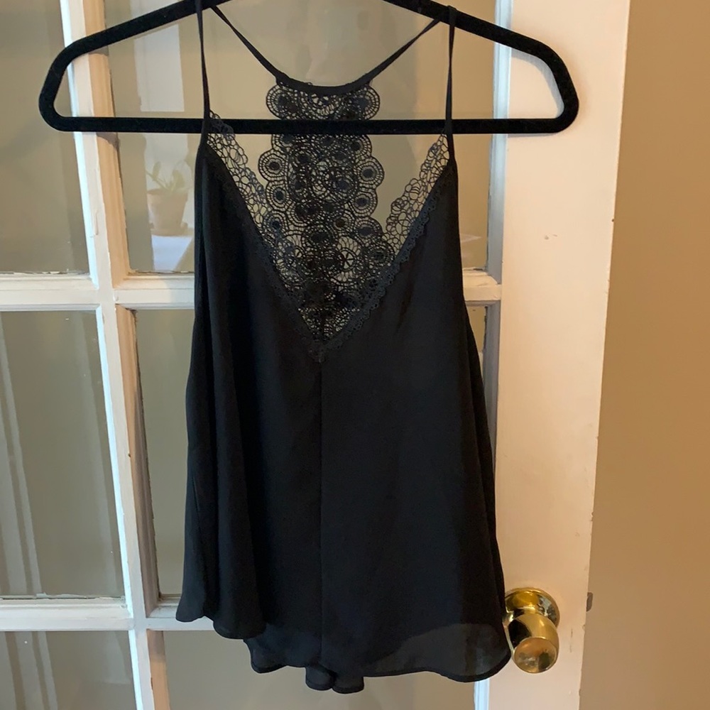 Black swing tank. Beautiful detail! Size large.